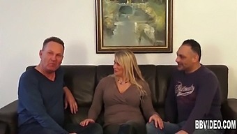 A Well-Endowed German Mother With Large Breasts Handles Two Penises