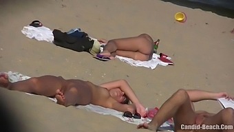 Hidden Camera Captures Nude Couples In Their Natural Element At A Nudist Beach